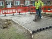 Geocell filled with angular stone for a tree root protection drivway project